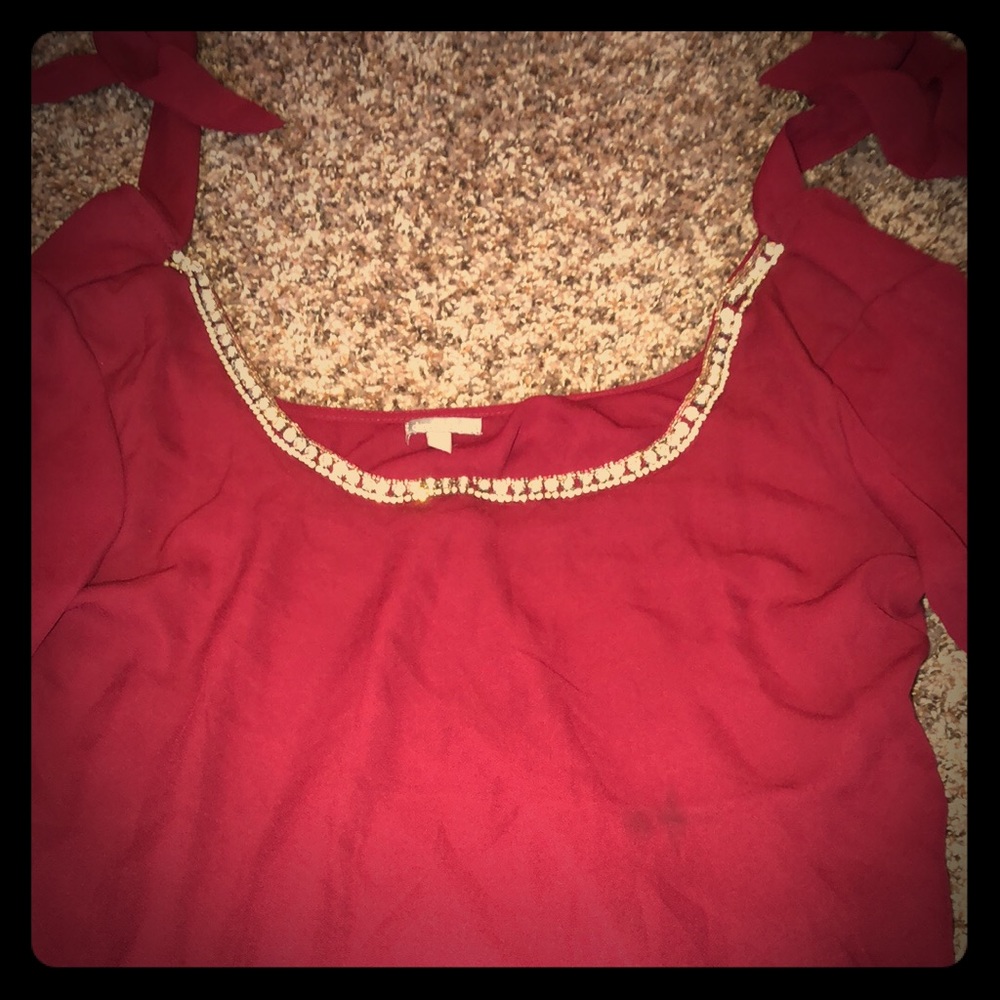 Burgundy jeweled top.
